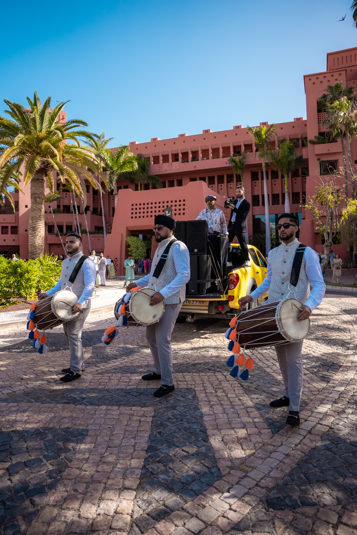 Dhol players performing at a wedding