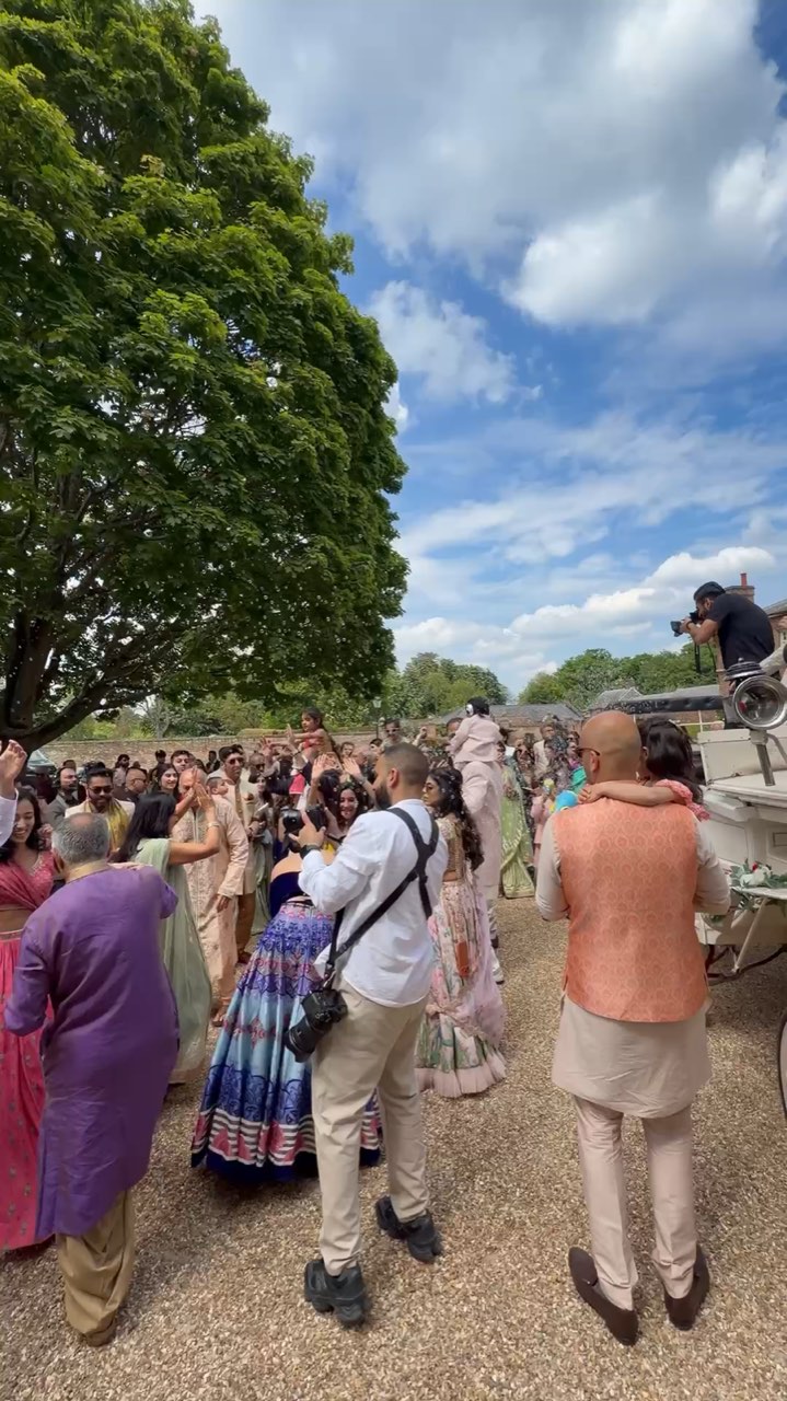 Dhol players performing at a wedding clip